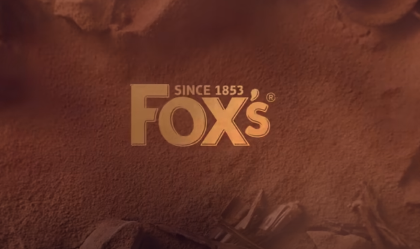 Fox's Fabulous logo against cocoa background