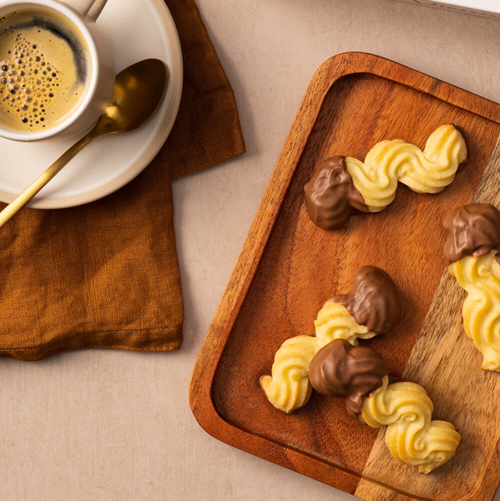 Viennese chocolatey biscuits and a cup of coffee