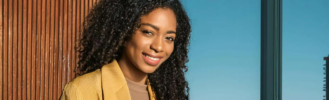 Young woman working with the PC