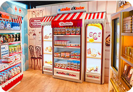 Nutella and Kinder airport store displays with products and golden Ferrero Rocher shelf