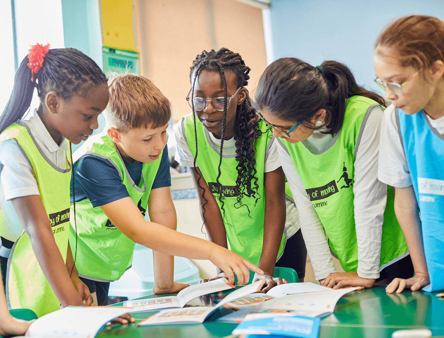 Young people playing in a classroom