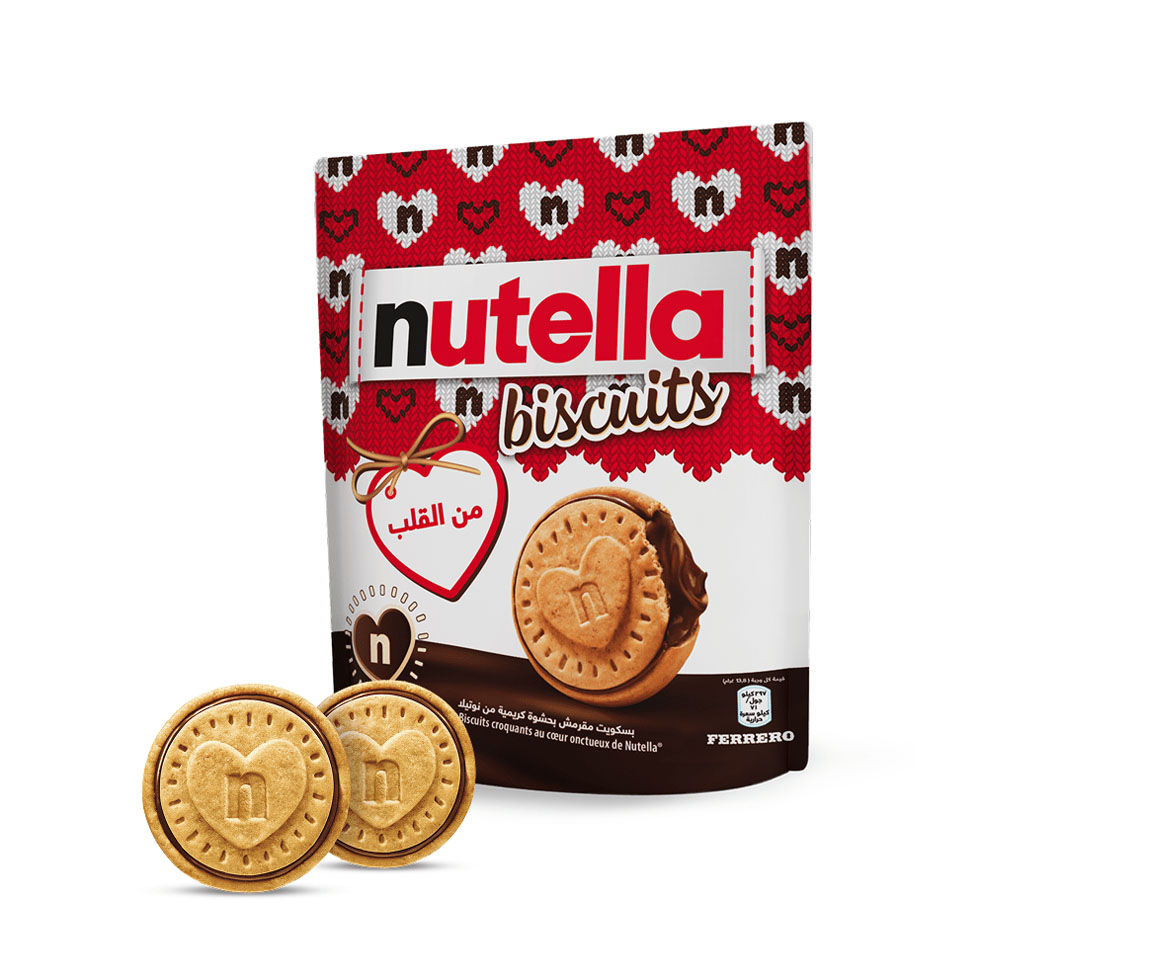 A packet of Nutella® Biscuit Christmas Edition on a white background with two biscuits standing in front of the packet.