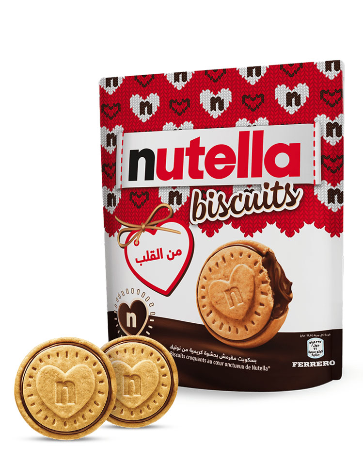 A packet of Nutella® Biscuit Christmas Edition on a white background with two biscuits standing in front of the packet.