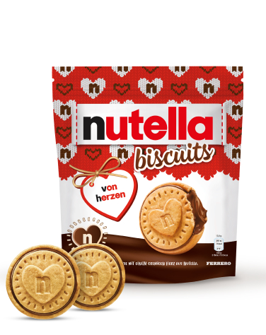 A packet of Nutella® Biscuit Christmas Edition on a white background with two biscuits standing in front of the packet.