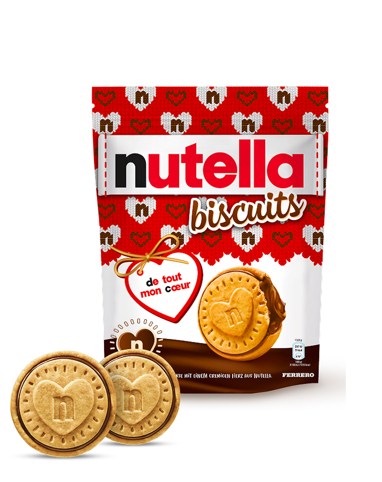 A packet of Nutella® Biscuit Christmas Edition on a white background with two biscuits standing in front of the packet.