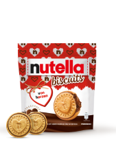 A packet of Nutella® Biscuit Christmas Edition on a white background with two biscuits standing in front of the packet.